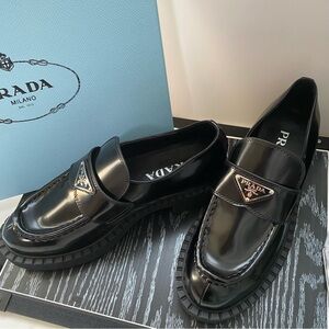Prada Black Patent Leather Women's Lug Sole Loafers with Logo Plaque